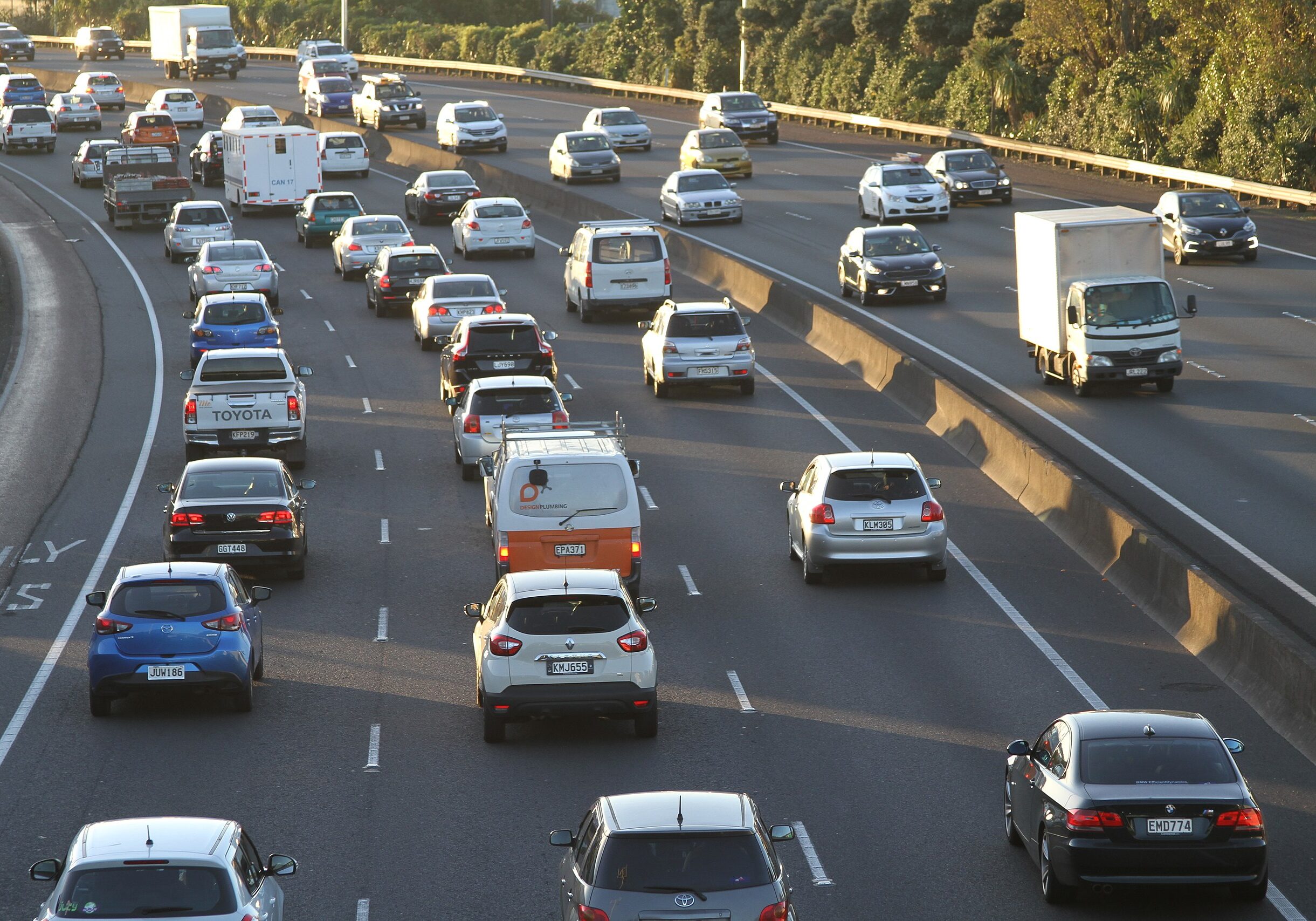 Cars_in_traffic_in_Auckland,_New_Zealand_-_copyright-free_photo_released_to_public_domain